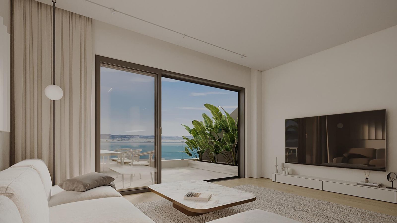 Modernt vardagsrum med havsutsikt i Rayos del Sol